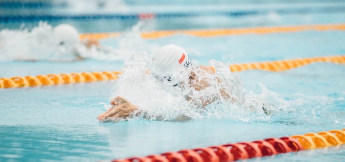 Boy swimming breaststroke